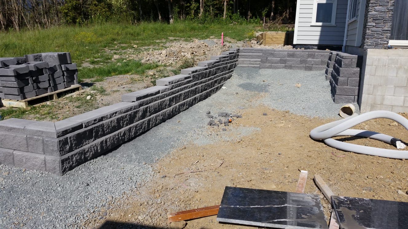 Count on us for strong barriers against the landscape. Whether it's timber, stone, or shotcrete solutions, we've got you covered. Our expertise is your assurance of quality!